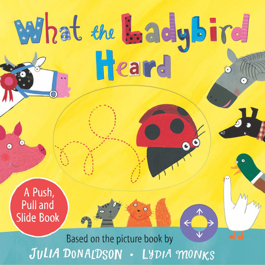 What the Ladybird Heard: A Push, Pull and Slide Board Book by Julia Donaldson