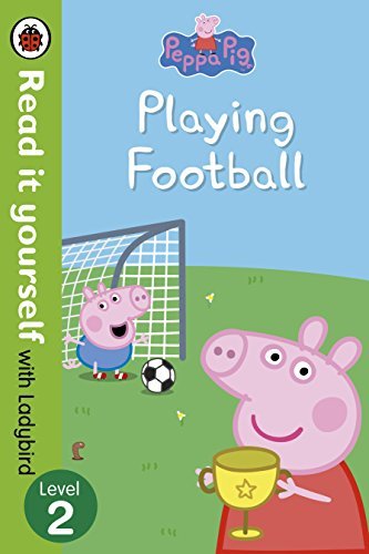 Playing Football by Ladybird